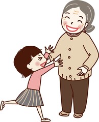 祖母に抱きつこうとする孫。