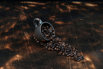Cup of coffee, bag and scoop on old rusty background, free space for text