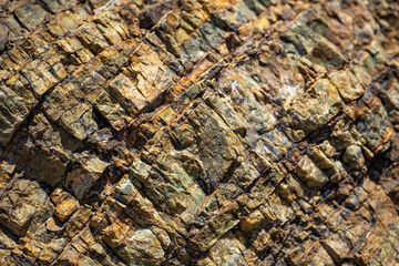 Old stone minerals covered with lichen. Mountain textures of stones. 