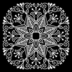 Hand draw of mandala with round floral ornament pattern.	