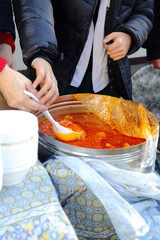 Borscht in a large pot outside. Festive treat
