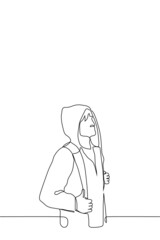 man in hoodie stands with backpack - one line drawing.  man with hood on  head holds the straps of backpack with both hands. concept of traveler, tourist, student