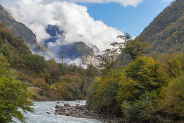 Fototapeta na wymiar Beautiful panorama of the Caucasus mountains on a sunny autumn day