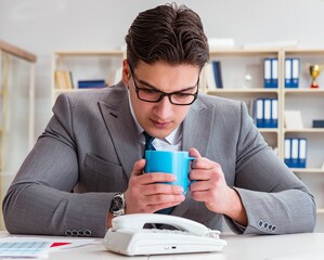 Businessman expecting important call on phone