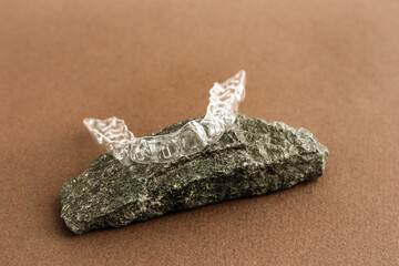 Transparent invisible dental aligners or braces applicable for an orthodontic dental treatment.	