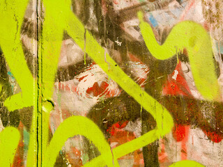 Grungy walls with colorful graffiti elements