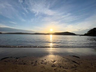 sunset over the sea and beach, Palm Beach, NSW Australia 
