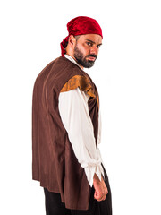 Muscular male pirate in studio shot, wearing open vest