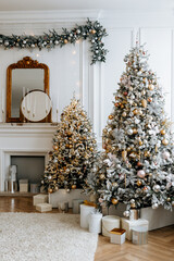 Beautiful Christmas tree with festive gold, white decor against blurred lights on background. Christmas and New Year concept. 