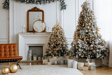 Beautiful Christmas tree with festive gold, white decor against blurred lights on background. Christmas and New Year concept. 