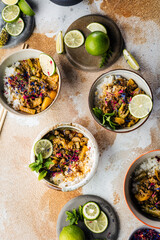 Delicious traditional asian curry in bowls.