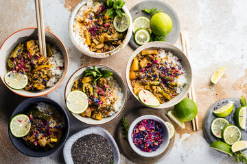 Delicious traditional asian curry in bowls.