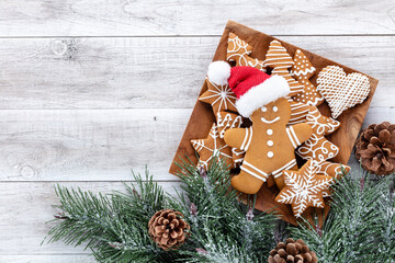 Homemade christmas gingerbread cookies on wooden table.