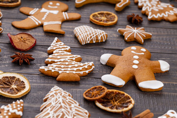 Obraz na płótnie Canvas Homemade christmas gingerbread cookies on wooden table.