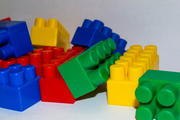 a multi-colored children's designer is lying on a white light table