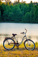 bike standing by the lake - 466128244