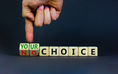 No or your choice symbol. Businessman turns wooden cubes and changes words 'no choice' to 'your choice'. Beautiful grey background, copy space. Business and no or your choice concept.