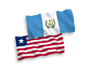 National vector fabric wave flags of Republic of Guatemala and Liberia isolated on white background. 1 to 2 proportion.