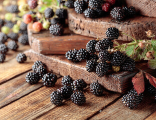 Fresh blackberries on a wooden table.