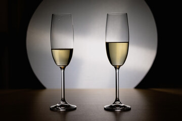 Two glasses of champagne with black and white background  