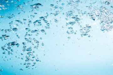 Bubbles of water on blue background