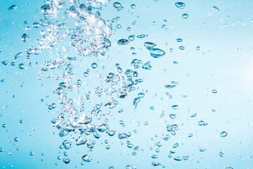 Bubbles of water on blue background