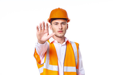 working man in orange uniform posing construction