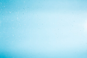 Bubbles of water on blue background