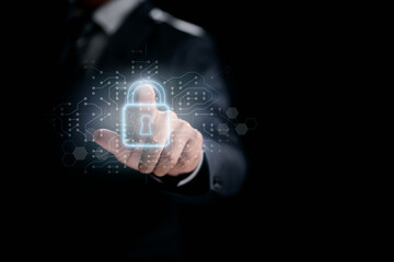 Network of cybersecurity. Internet technology and the padlock icon on a virtual interface, a businessman protects data and personal information. GDPR (General Data Protection Regulation) concept.