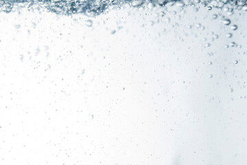 Bubbles of water on blue background