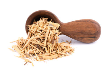 Muira Puama herbal tea in wooden spoon, isolated on white background. Natural potency wood,...