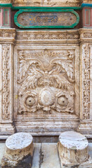 White marble carved wall of an ablution fountain at the courtyard of the great Mosque of Muhammad Ali Pasha, Citadel of Cairo, Egypt. Engraved test says: Ablution is a believer's weapon