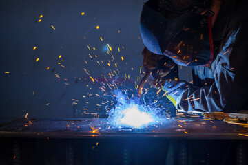 Welding of metal structures by semi-automatic arc welding. MIG welding.