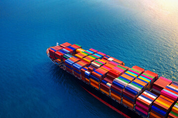 Aerial view of container cargo ship in sea.