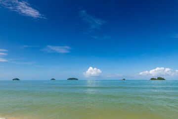 Fototapeta na wymiar long exposure landscape, beach, sea, clouds, blue sky