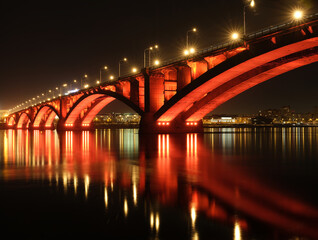 Fototapeta na wymiar cityscape bridge over the river at night