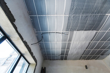 Ceiling insulation with modern thermal insulation materials. Bottom up view