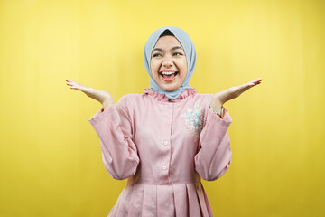 Beautiful cheerful Muslim young woman, surprised, shocked, isolated