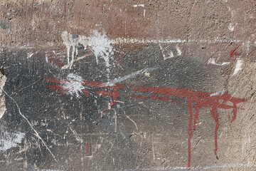 abstract paint smudges and scratches on textured background