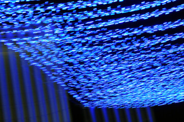 Blue Christmas lights. Blurred background