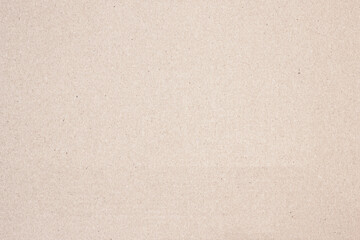 A sheet of brown cardboard. Paper natural texture.