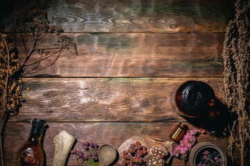 Naklejka na ściany i meble Magic potion or herbal medicine concept background.