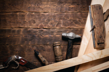 Construction work tools on the carpenter workbench flat lay background with copy space.