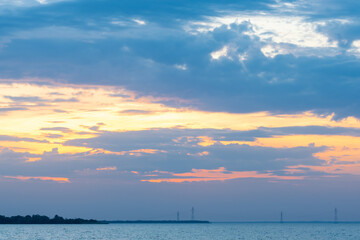 Beautiful, colorful sunset, sunrise over a wide river.