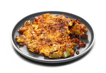Egg omelette with slice leek and cubes tomato in plate isolated on white