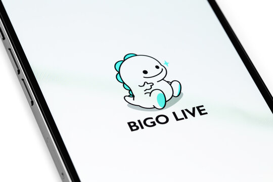 Bigo Live logo mobile app on screen smartphone, iPhone closeup. Bigo Live is a live streaming platform. Moscow, Russia - October 20, 2021