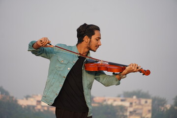 musician playing violin. Music and musical tone concept. images of man musician