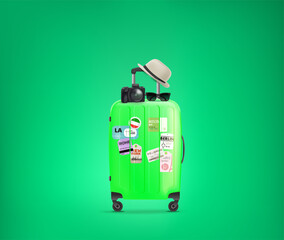 Fototapeta premium Travel bag with paper stickers, hat, digital camera and sunglasses.