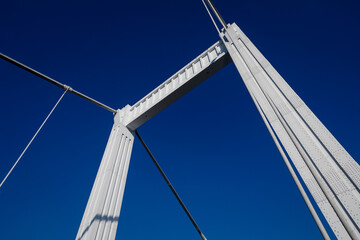 Elizabeth bridge steel structure detail in Budapest with clear blue sky background- view from the bottom