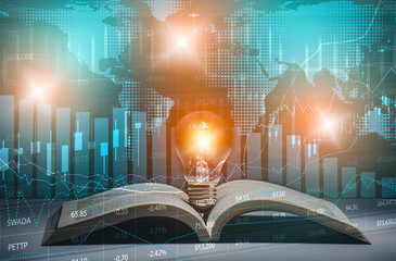 Light bulb and opened vintage book style vintage dark background concept and Stock market or forex...